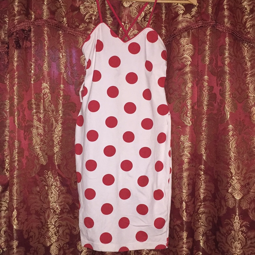 White stretchy dress with red polkadots